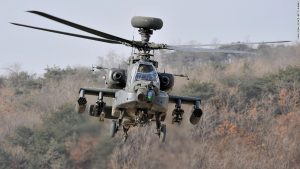 A US Apache helicopter takes to the air during an aerial gunnery exercise at a military firing range in Pocheon, near the heavily-fortified border with North Korea, on January 23, 2009. The new US administration will make North Korea's nuclear disarmament a priority despite other pressing world problems, South Korea's chief nuclear negotiator said. AFP PHOTO/JUNG YEON-JE (Photo credit should read JUNG YEON-JE/AFP/Getty Images)