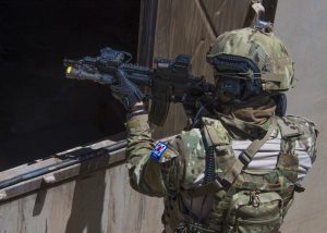 A member of the Republic of Korea SEALs guards a window during an air assault exercise as part as Rim of the Pacific (RIMPAC) Exercise 2014. The world's largest international maritime exercise, RIMPAC provides a unique training opportunity that helps participants foster and sustain the cooperative relationships that are critical to ensuring the safety of sea lanes and security on the world's oceans. Twenty-two nations, more than 40 ships, six submarines, more than 200 aircraft and 25,000 personnel are participating in RIMPAC. (U.S. Navy photo by Mass Communication Specialist 1st Class Daniel Gay/Released)