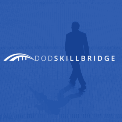 An individual walking on a tiled surface with the Dodskilbridge logo overlay, symbolizing skills development and professional growth through the nonprofit organization.